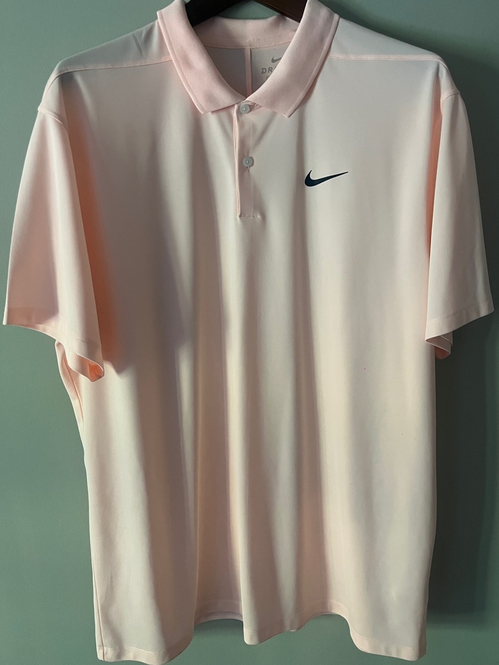 Nike Men’s Light Pink Polo with Navy Swoosh
